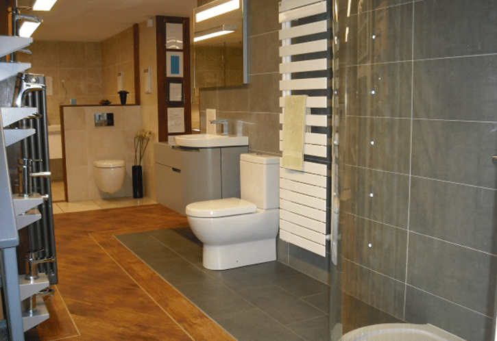 Designer bathroom - white bathroom suite on black and white tiles